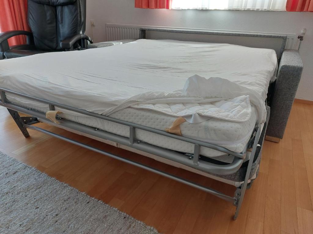 Postel nebo postele na pokoji v ubytování Ferienwohnung Metzler - Blick auf die Berge