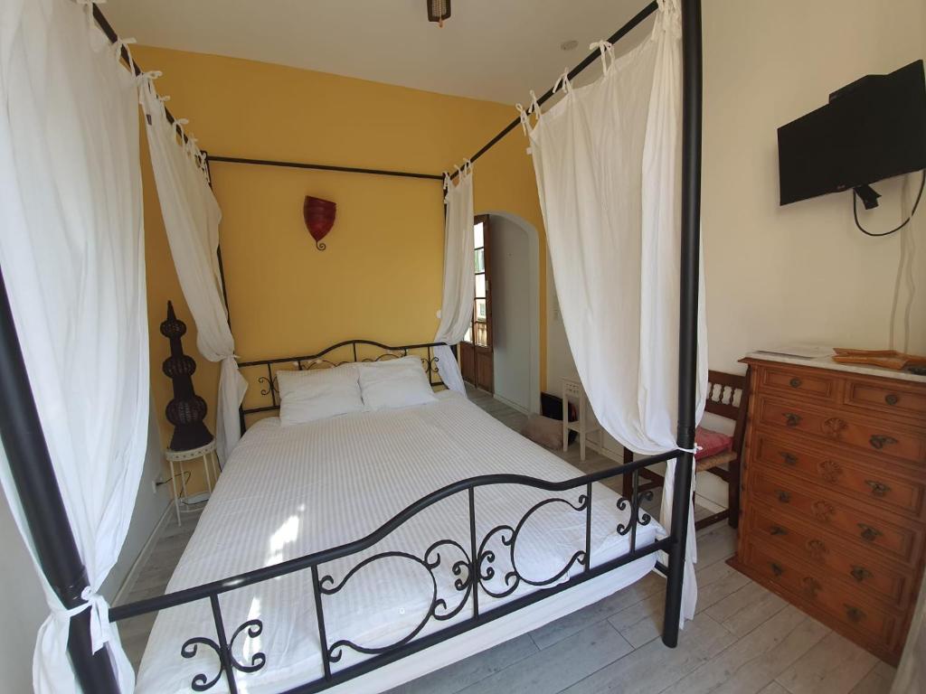 Postel nebo postele na pokoji v ubytování CasaDesigual