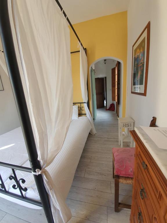 Postel nebo postele na pokoji v ubytování CasaDesigual
