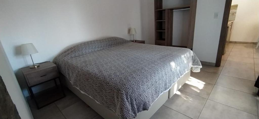 Postel nebo postele na pokoji v ubytování Cabañas Agua Clara