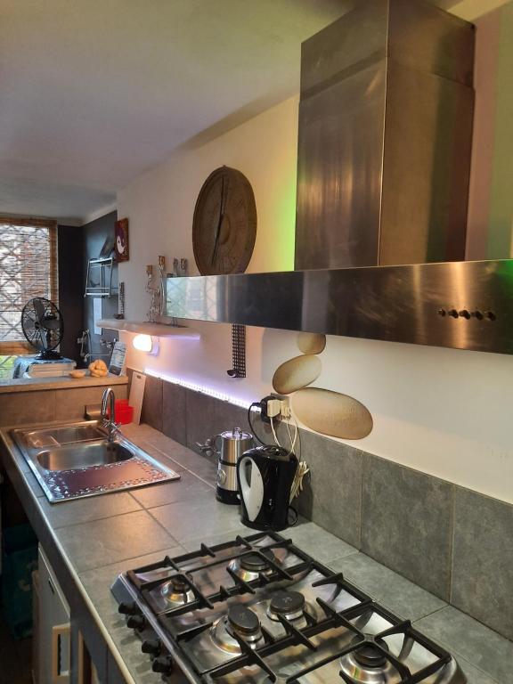 Kuchyňa alebo kuchynka v ubytovaní LE TERRE DEL DRAGO Apartment
