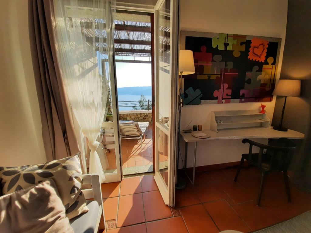 Posedenie v ubytovaní LE TERRE DEL DRAGO Apartment