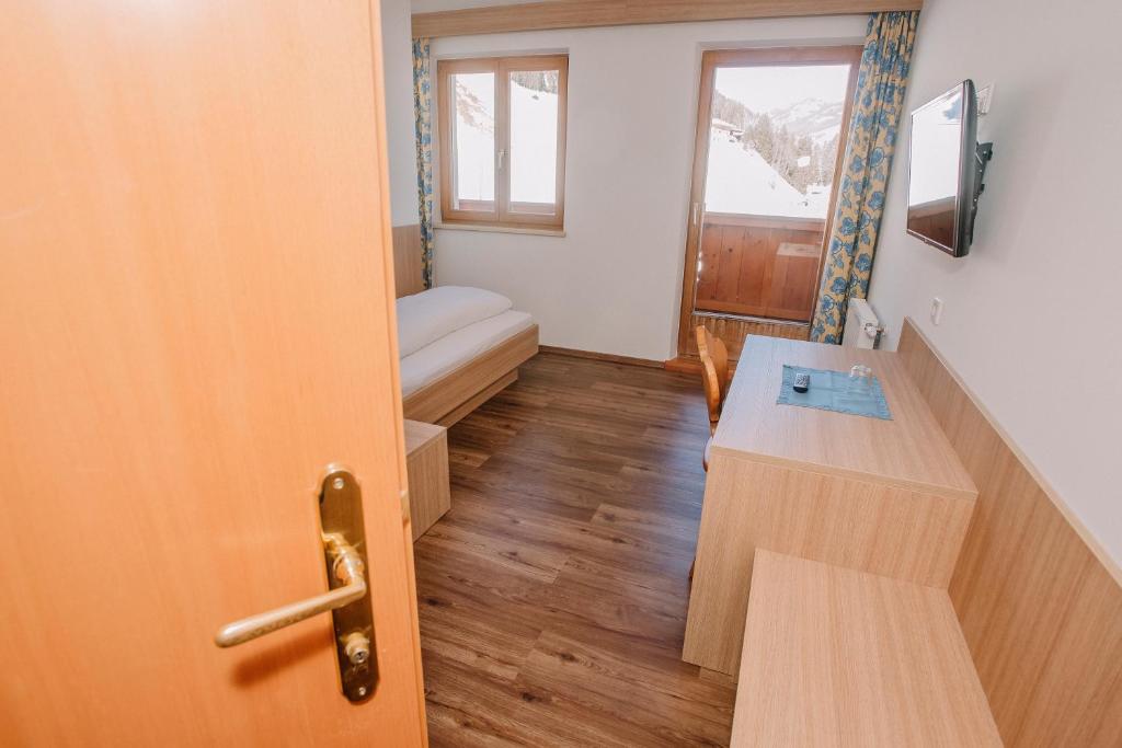 Postel nebo postele na pokoji v ubytování Gasthof Haidbach