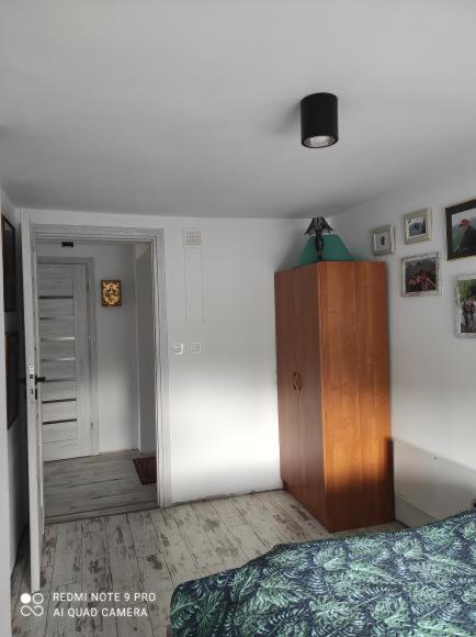 Łóżko lub łóżka w pokoju w obiekcie Apartament u Bena