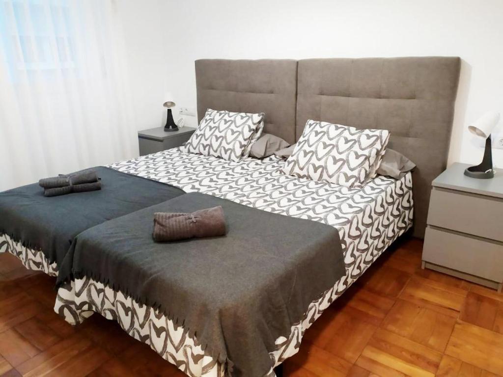 Postel nebo postele na pokoji v ubytování Apartamento en el centro de Laredo Menendez Pelayo 17