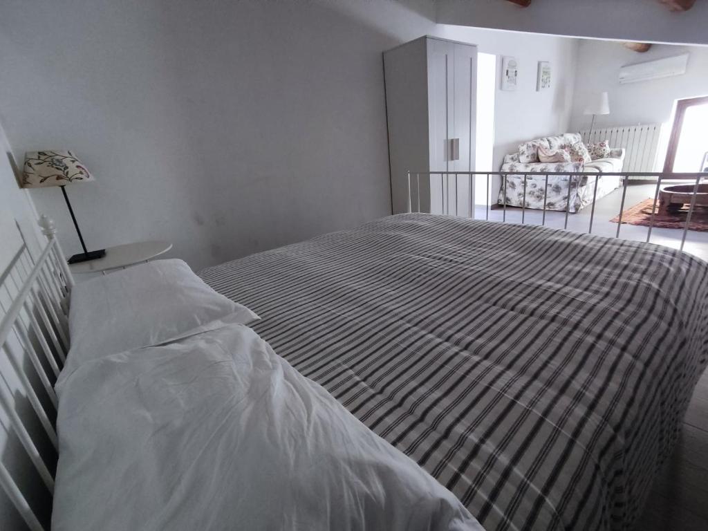 Posteľ alebo postele v izbe v ubytovaní Veranda Vista Mare
