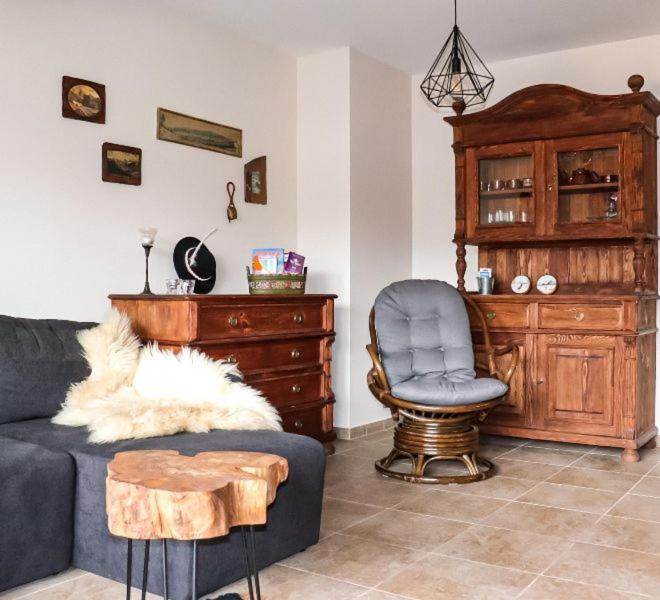 Posedenie v ubytovaní Apartament z basenem