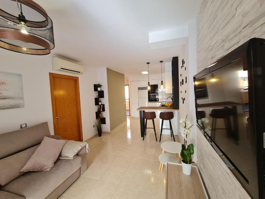 Kuchyňa alebo kuchynka v ubytovaní Sybarix Apartment: Precioso apartamento con vistas al golf y el mar