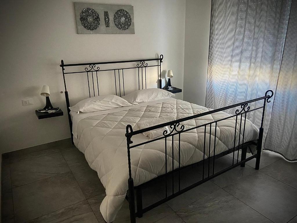 Postel nebo postele na pokoji v ubytování B&B FRONTEMARE San Salvo Marina CH