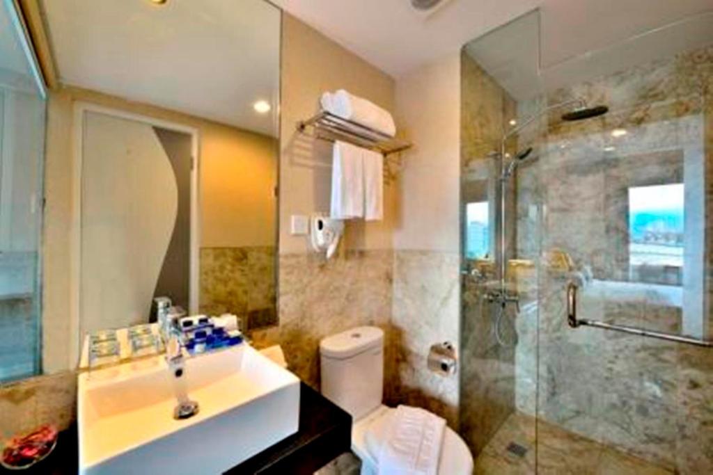 Koupelna v ubytování Serela Cihampelas by KAGUM Hotels