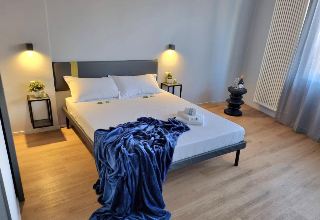 Postel nebo postele na pokoji v ubytování Residenza Gramsci