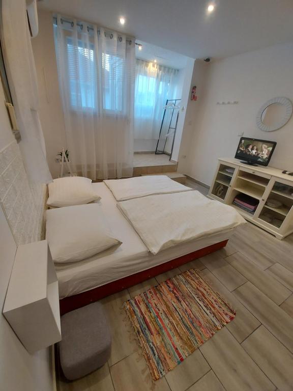 Postel nebo postele na pokoji v ubytování Studio Apartment CONTE Split