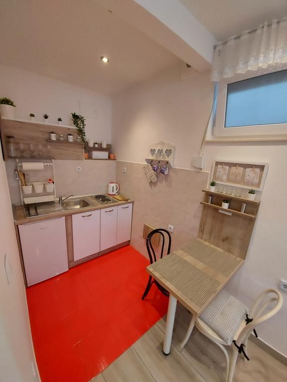 Kuchyň nebo kuchyňský kout v ubytování Studio Apartment CONTE Split