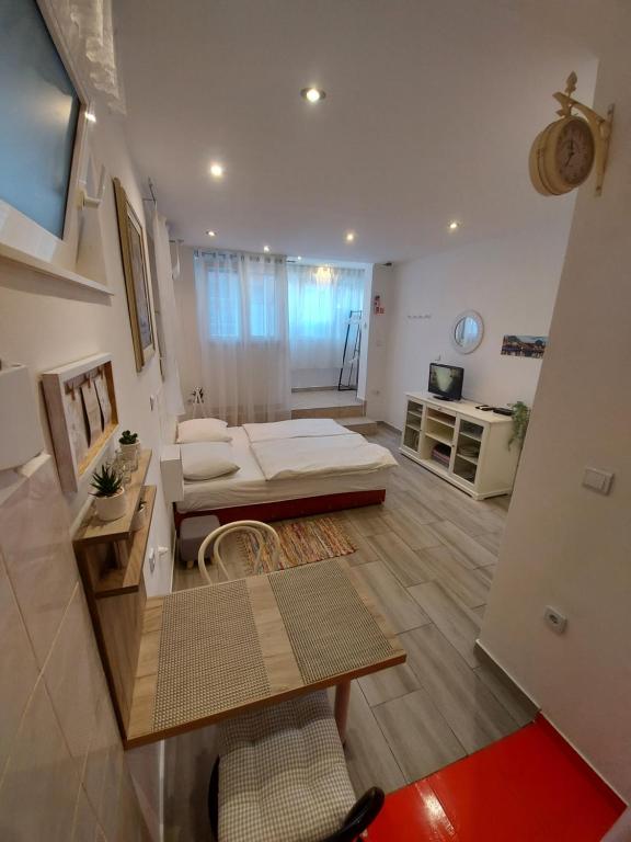 TV a/nebo společenská místnost v ubytování Studio Apartment CONTE Split