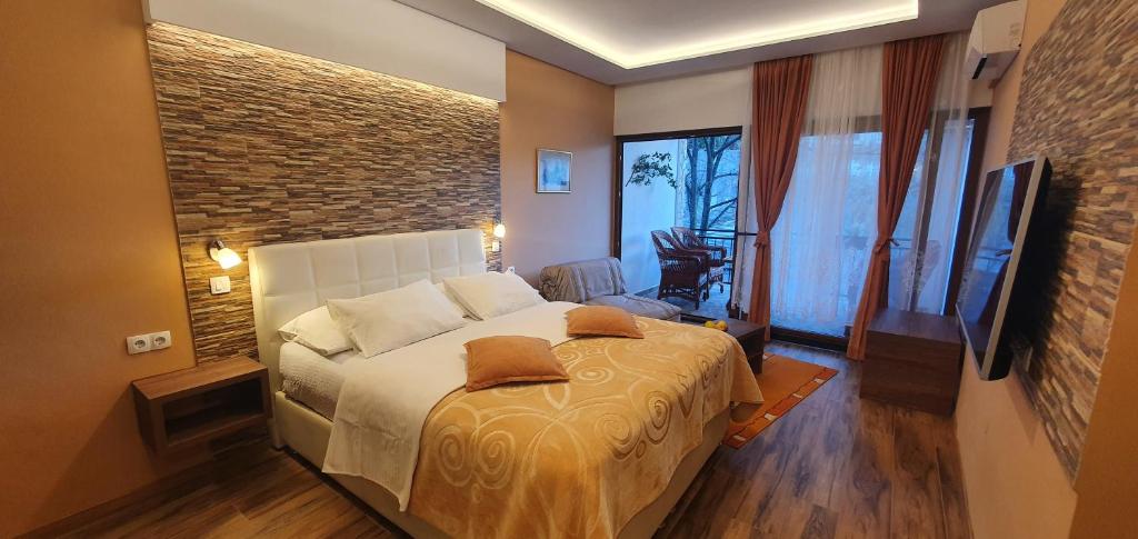 Postel nebo postele na pokoji v ubytování Villa Cardak