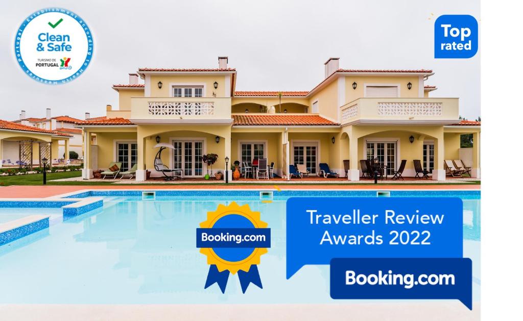 a villa with a swimming pool and the top rated traveller review awards at Burgo Dom Afonso V Golf & Beach Resort in Casal da Lagoa Seca