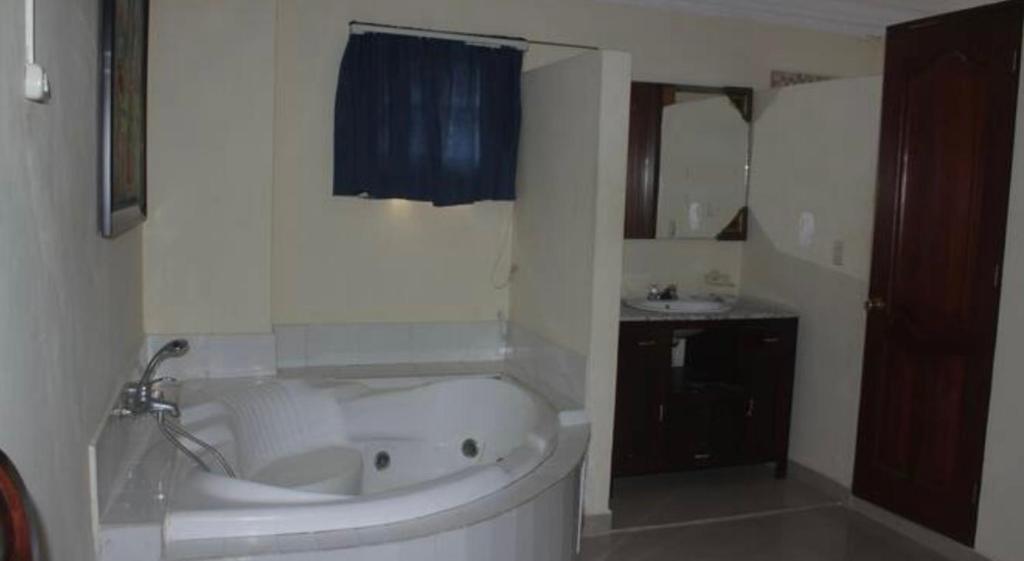 Koupelna v ubytování Hotel Luis V Santo Domingo