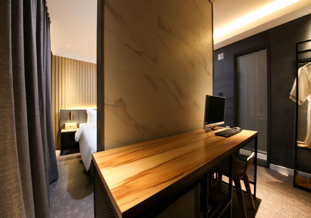 TV a/nebo společenská místnost v ubytování West In Hotel Yeosu
