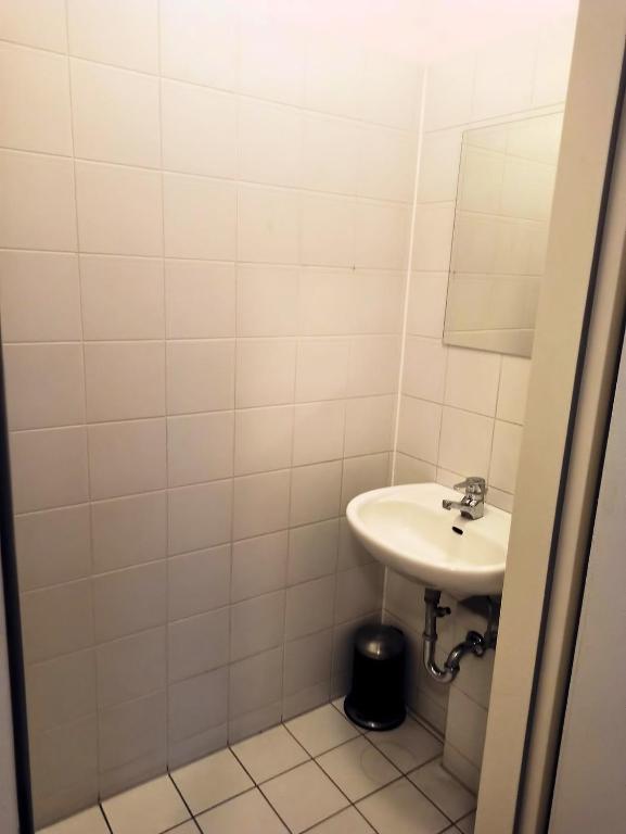 Koupelna v ubytování Puschkin Rooms