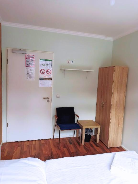Postel nebo postele na pokoji v ubytování Puschkin Rooms