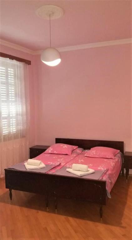 Postel nebo postele na pokoji v ubytování Guesthouse Fatima