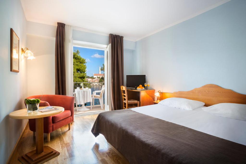 Postel nebo postele na pokoji v ubytování Maistra Select Island Hotel Katarina