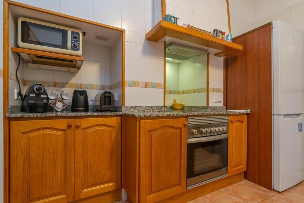 A kitchen or kitchenette at Es Molí Can Torres