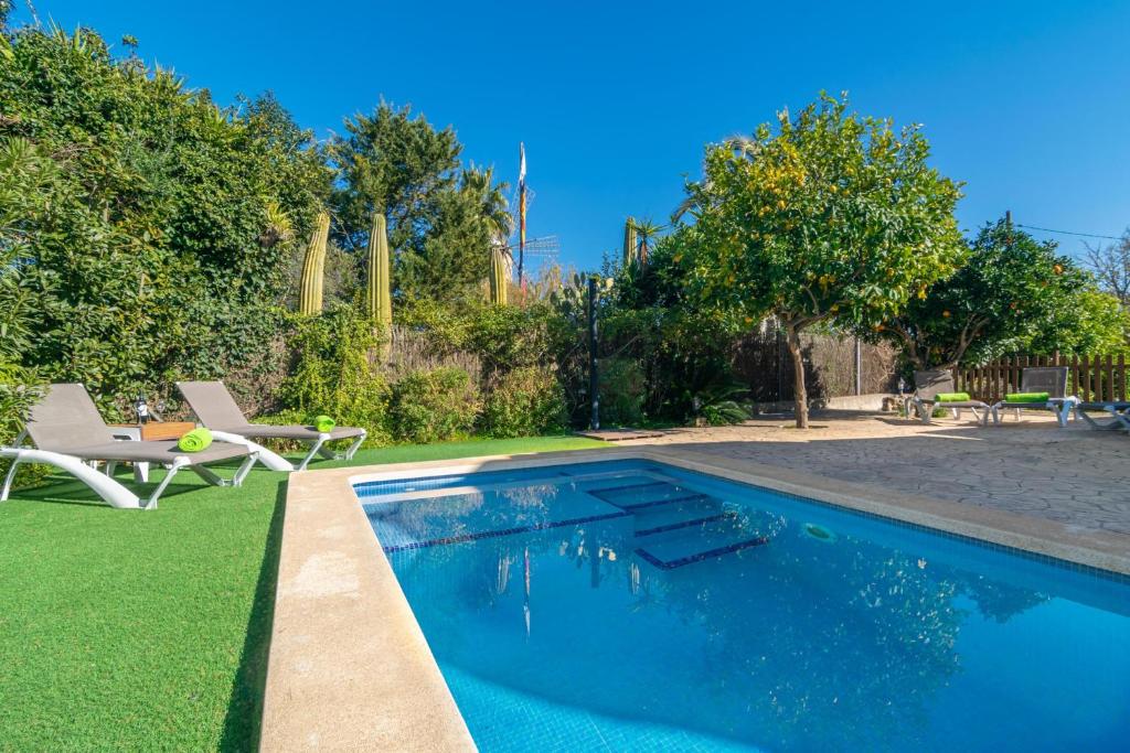 The swimming pool at or close to Es Molí Can Torres