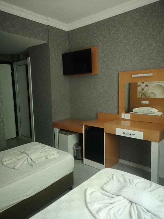 Postel nebo postele na pokoji v ubytování Anita Kemer Noch Hotel - All Inclusive
