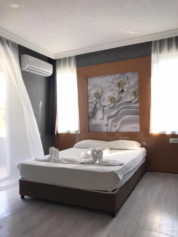 Postel nebo postele na pokoji v ubytování Anita Kemer Noch Hotel - All Inclusive