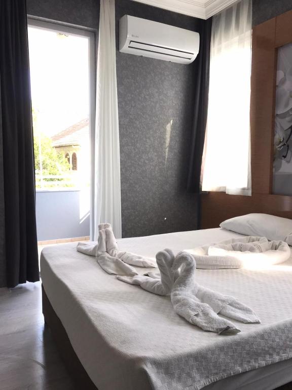 Postel nebo postele na pokoji v ubytování Anita Kemer Noch Hotel - All Inclusive