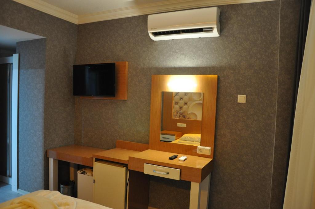 TV a/nebo společenská místnost v ubytování Anita Kemer Noch Hotel - All Inclusive