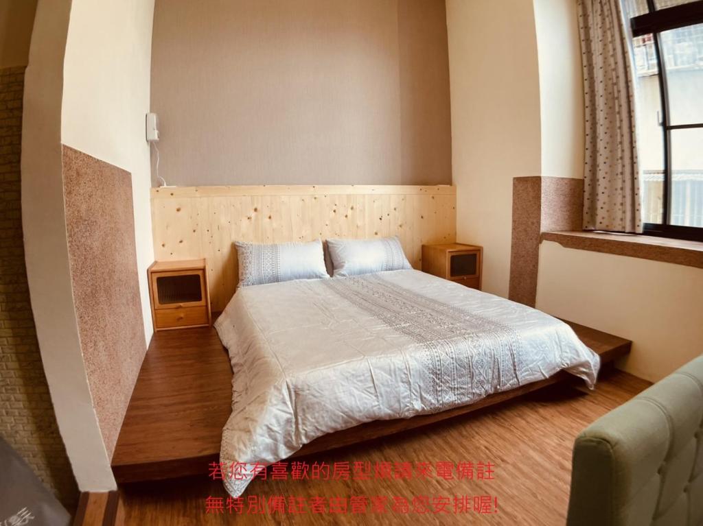 Postel nebo postele na pokoji v ubytování Green Only Homestay