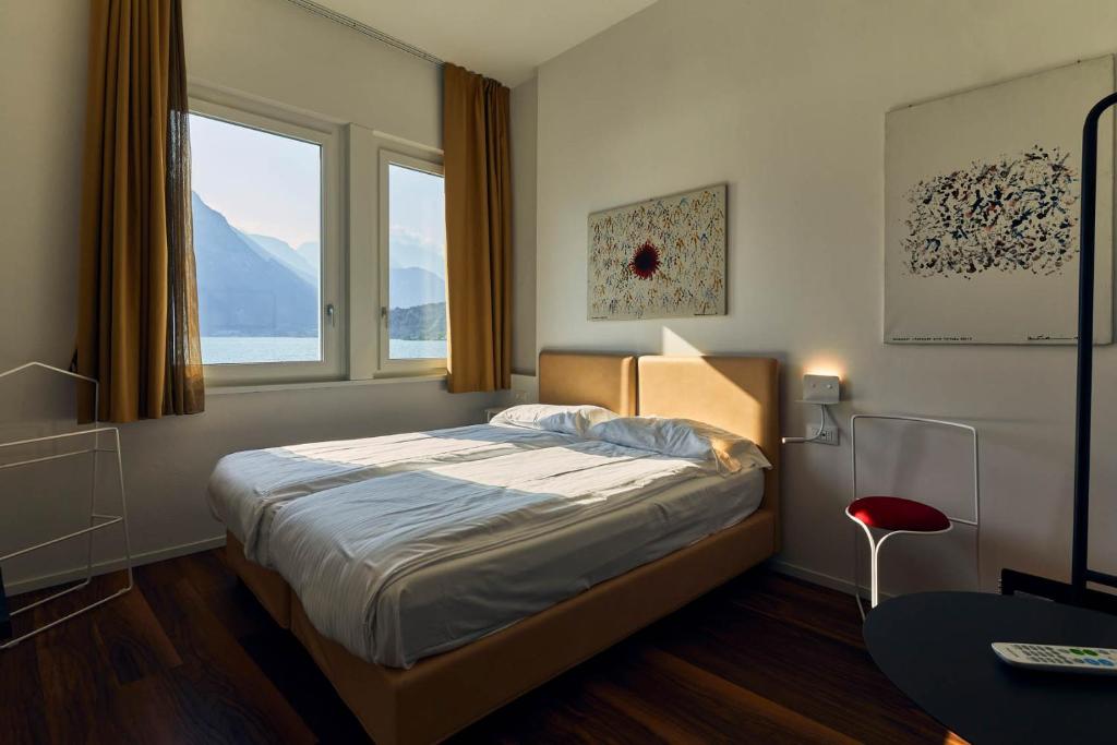 Posteľ alebo postele v izbe v ubytovaní Hotel Paradiso Conca d'Oro