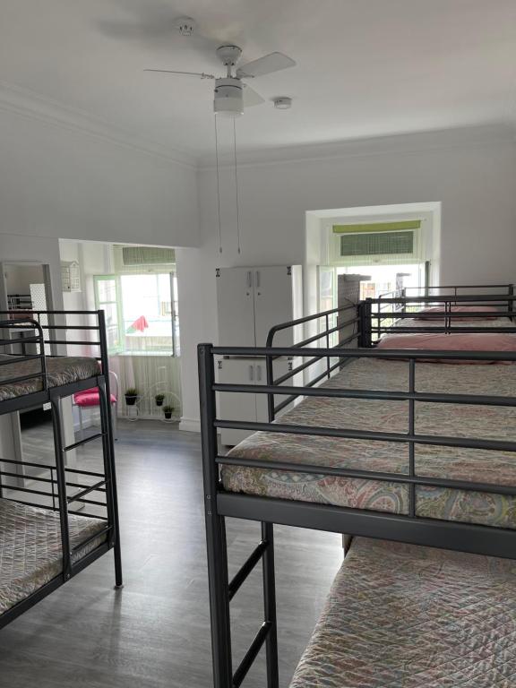 Postel nebo postele na pokoji v ubytování Aloha Hostel