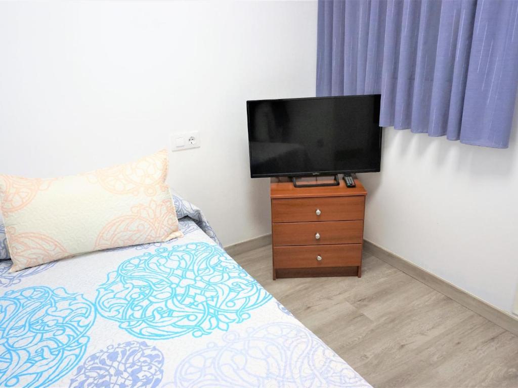 TV a/nebo společenská místnost v ubytování Villa Service - Guimera