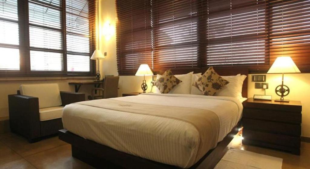 Postel nebo postele na pokoji v ubytování Colombo Court Hotel & Spa