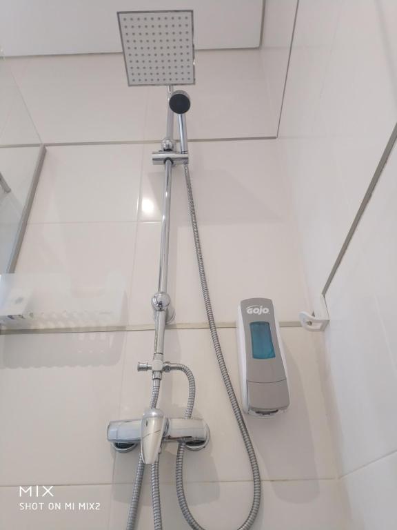 a camera on a tripod in a room at SBT Sun Beach Terrace "The best house" in Figueira da Foz