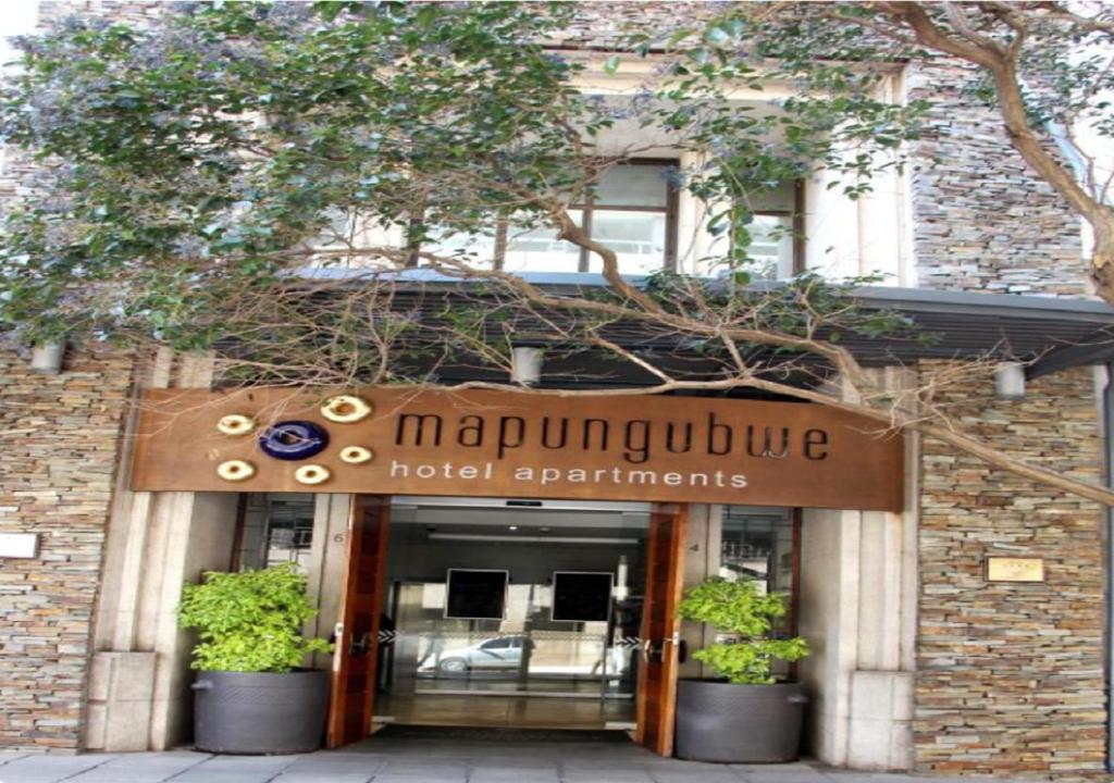 a building with a sign that reads manipulating hotel apartments at Mapungubwe Apartments in Johannesburg