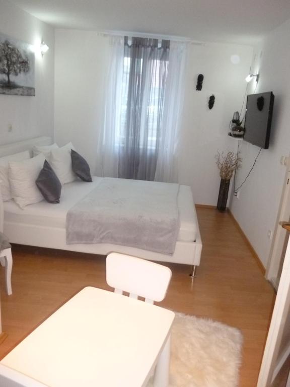 Posteľ alebo postele v izbe v ubytovaní House Niko