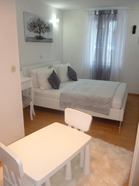 Posteľ alebo postele v izbe v ubytovaní House Niko