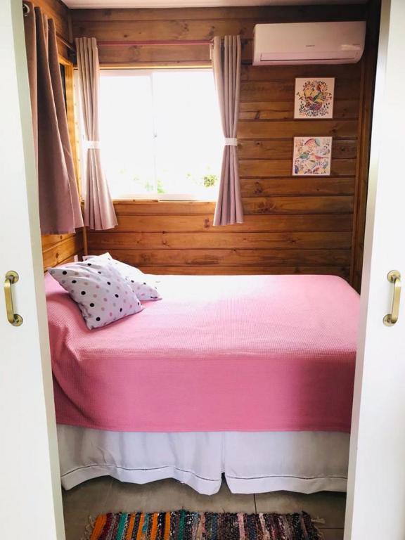Postel nebo postele na pokoji v ubytování Bangalôs Floripa - Tiny House