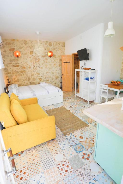 A television and/or entertainment centre at Ravi Boutique Home - 1 minute walk from beach
