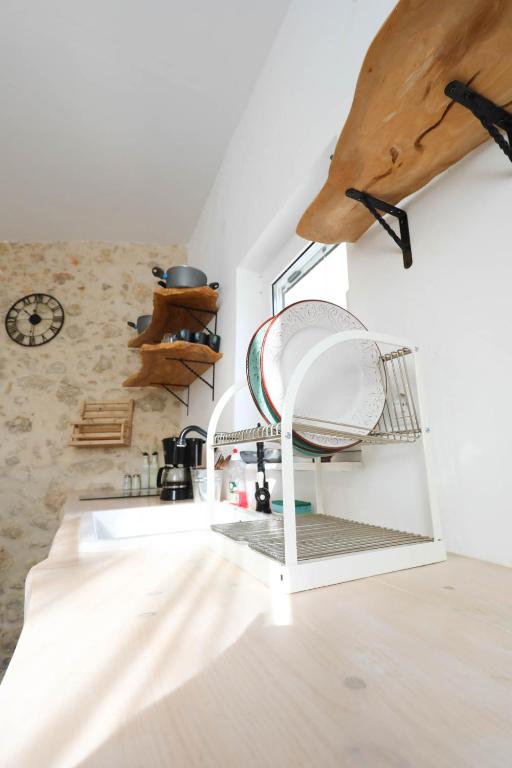 A kitchen or kitchenette at Ravi Boutique Home - 1 minute walk from beach