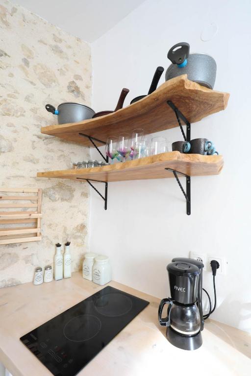 A kitchen or kitchenette at Ravi Boutique Home - 1 minute walk from beach