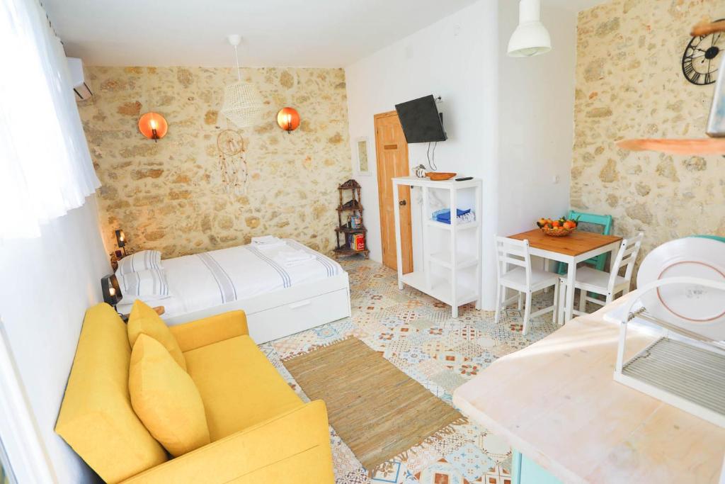 A bed or beds in a room at Ravi Boutique Home - 1 minute walk from beach