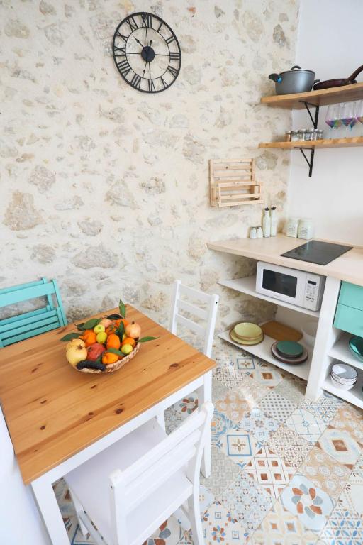 A kitchen or kitchenette at Ravi Boutique Home - 1 minute walk from beach