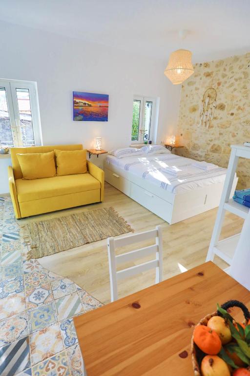 A television and/or entertainment centre at Ravi Boutique Home - 1 minute walk from beach
