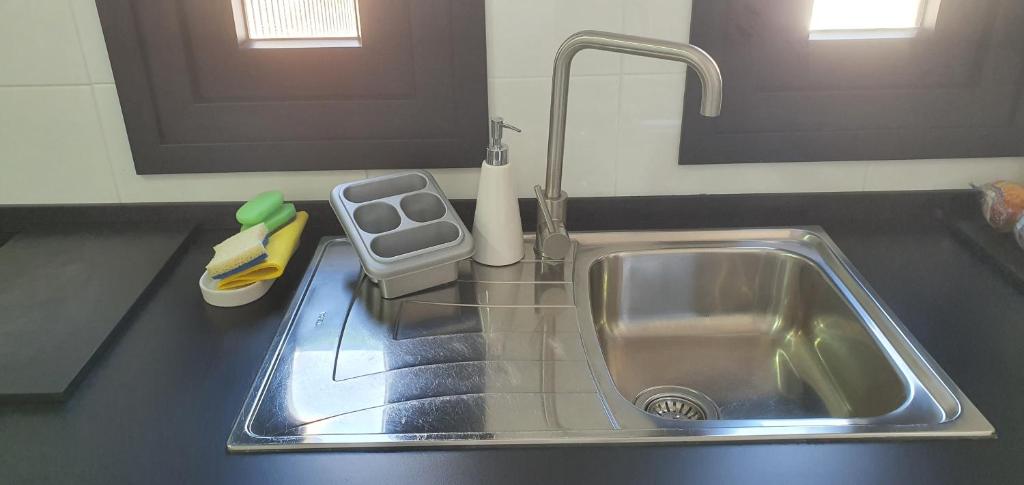 A kitchen or kitchenette at CARLOS APARTAMENTo
