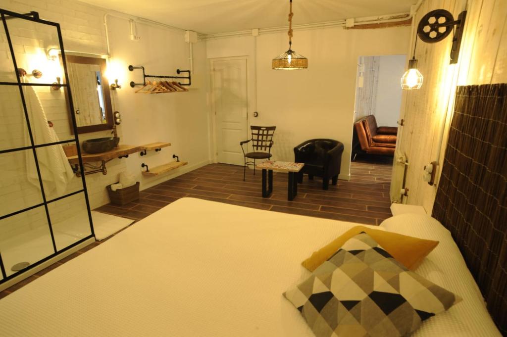 Postel nebo postele na pokoji v ubytování Lombera Apartamentos